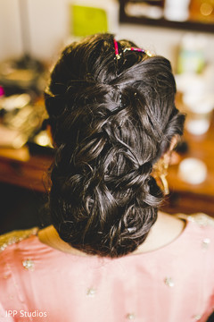 Indian bride getting her hair done Indian bride getting her hair done