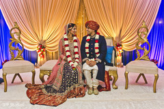 Indian bride and groom looking at each other Indian bride and groom looking at each other