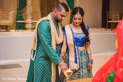 Indian bride and groom during sangeet Indian bride and groom during sangeet