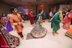 Indian bride and groom during sangeet night Indian bride and groom during sangeet night