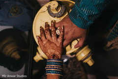 Indian bride's hand on top of groom's hand Indian bride's hand on top of groom's hand