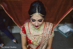 Sweet indian bride getting ready bridal jewelry,indian bride getting ready,indian bride hair and makeup