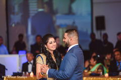 Adorable indian bride and groom dancing dj and entertainment,indian wedding reception,indian bride fashion,indian groom suit