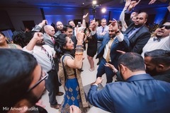 Indian bride and groom dancing dj and entertainment,indian wedding reception,indian bride reception fashion,indian groom fashion