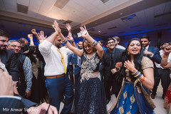Indian bride and groom dancing the night away dj and entertainment,indian wedding reception,indian bride reception fashion,indian groom fashion