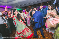 Indian bride and groom showing off their moves. Indian bride and groom showing off their moves.