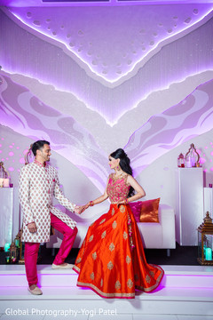 Indian bride and groom holding hands Indian bride and groom holding hands