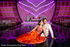 Indian couple posing for photo shoot Indian couple posing for photo shoot