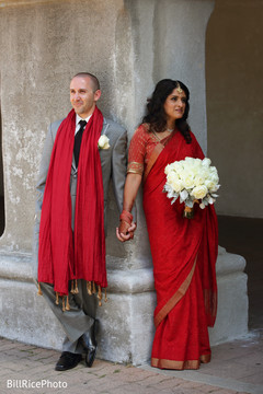 Stunning bride in red and gold lengha