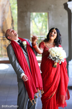 Indian groom enjoying their photoshoot