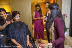 Indian bride being dolled up. Indian bride being dolled up.