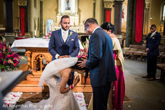 Indian Christian fusion wedding ceremony ritual. indian bride,indian groom,christian wedding ceremony