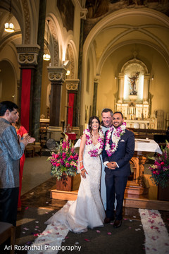 Sweet Indian couple's with flower garlands. indian bride,indian groom,christian wedding ceremony,jaimala