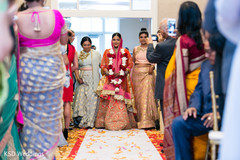 Drop-dead gorgeous Indian bride walking towards the mandap. indian wedding ceremony,indian bride,floral and decor