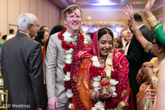 Indian couple walking out . indian wedding ceremony,indian wedding photography,indian bride and groom