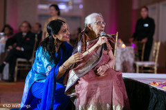 Lovely family guest giving a speech reception fashion,indian wedding reception