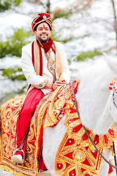 Indian groom riding a baraat white horse indian wedding baraat,baraat horse,indian groom fashion