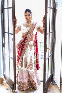 Stunning white and red bridal lengha. Stunning white and red bridal lengha.