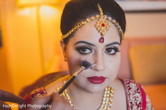 Indian bride being dolled up. Indian bride being dolled up.