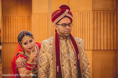 Lovely indian couple during their first look indian bride fashion,indian groom fashion