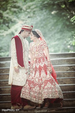 Sweet indian bride and groom indian groom sherwani,indian bride lengha,outdoor photography