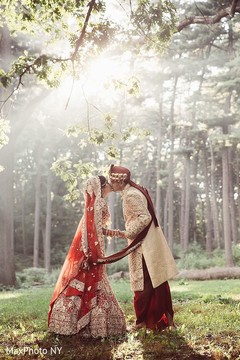 Stunning indian bride and groom kissing shoot indian groom sherwani,indian bride lengha,outdoor photography