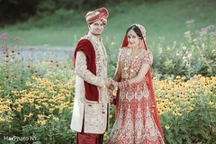 Adorable indian bride and groom holding hands outdoor photography,indian groom sherwani,indian bride lengha