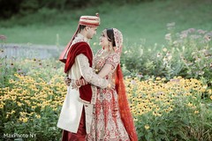 Lovely indian bride and groom hugging outdoor photography,indian groom sherwani,indian bride lengha