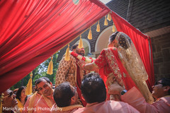 Jaimala ritual. indian bride,pre-wedding ritual,indian groom