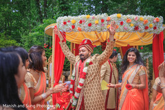 Joyful Indian groom. indian groom,indian wedding photograph,mandap