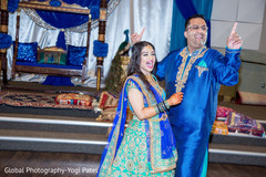 Indian bride and groom enjoying sangeet night Indian bride and groom enjoying sangeet night