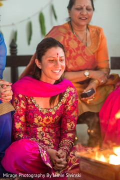 Beautiful indian bride during mehndi celebration pre- wedding celebrations,mehndi party,indian bride