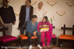 Lovely indian couple at their mehndi celebration pre- wedding celebrations,mehndi party,indian bride,indian groom