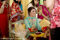 Gorgeous indian bride during mehndi party mehndi party,pre- wedding celebrations,indian bride fashion