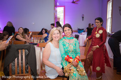 Sweet indian bride posing with guest pre- wedding celebrations,mehndi party,indian bride fashion,bridal jewelry