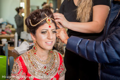 Opulent indian bride getting ready bridal jewelry,indian bride fashion,indian bride getting ready