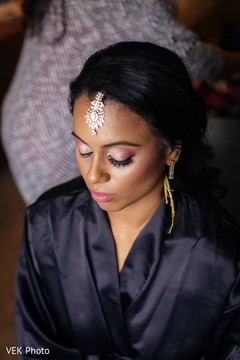 Dazzling indian bride getting ready indian bride,indian bride getting ready,indian bridal makeup,bridal tikka