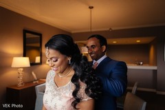 Indian groom helping bride getting ready indian bride fashion,indian groom fashion,indian bride getting ready,bridal jewelry
