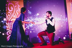 Adorable indian couple performing during sangeet Adorable indian couple performing during sangeet