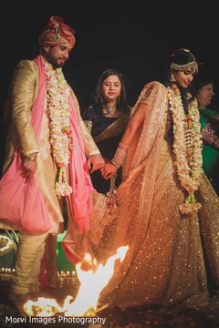Indian bride and groom Saptapadi ritual Indian bride and groom Saptapadi ritual