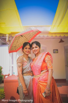 Beautiful indian bride posing with bridesmaid indian bride fashion,indian bridesmaids’ fashion,indian bride portrait