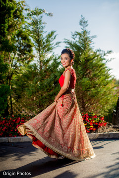 Lovely indian bride showing her lengha Lovely indian bride showing her lengha
