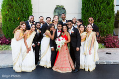 Indian couple with bridal party Indian couple with bridal party