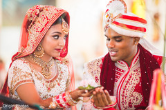 Indian bride and groom during their wedding ceremony indian wedding ceremony,indian wedding,indian wedding traditions