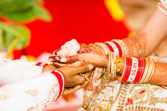 Indian bride and groom holding hands Indian bride and groom holding hands