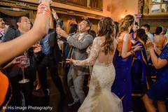 Newlyweds showing off their moves. dj,india fusion wedding,indian wedding reception