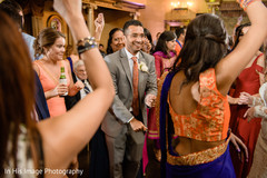 Vibrant Indian fusion wedding. dj,indian fusion wedding,indian wedding reception,indian groom