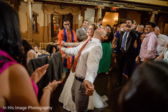 Newly wedded couple at the dance floor. dj,india fusion wedding,indian wedding reception