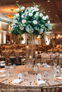 Tall floral centerpiece. indian wedding reception,floral and decor,planning and design