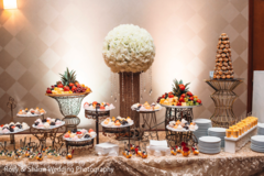 Charming wedding cakes and treats table. indian wedding reception,cakes and treats,catering
